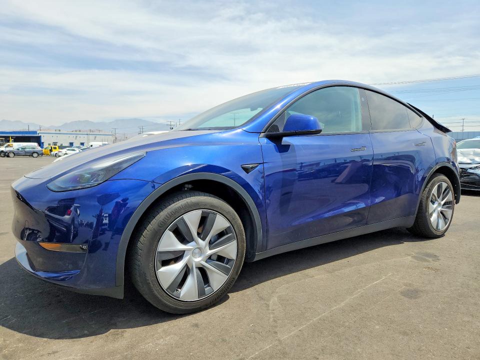 TESLA MODEL Y 2023 with VIN 7SAYGDED7PF964885 - Photo from auction