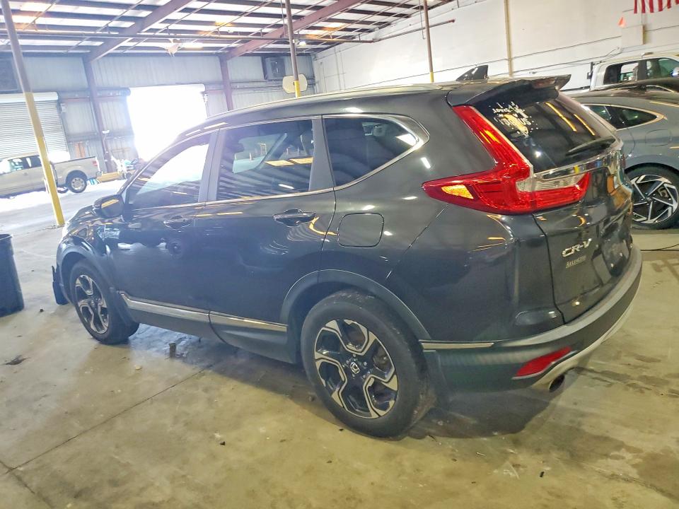 Photo 2 from auction – 2017 HONDA CR-V with VIN 2HKRW2H98HH632313