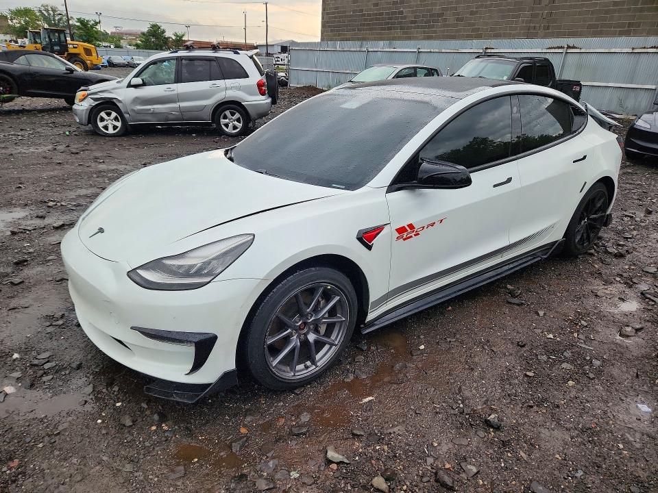 TESLA MODEL 3 2021 with VIN 5YJ3E1EB4MF858593 - Photo from auction
