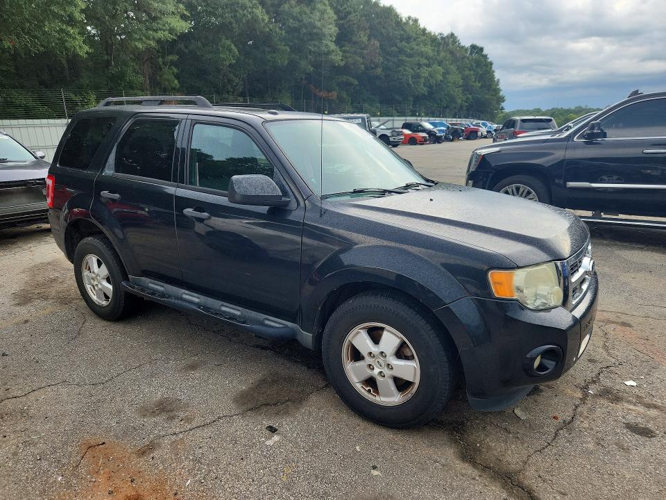 Photo 4 from auction – 2011 FORD ESCAPE with VIN 1FMCU0D70BKA41546