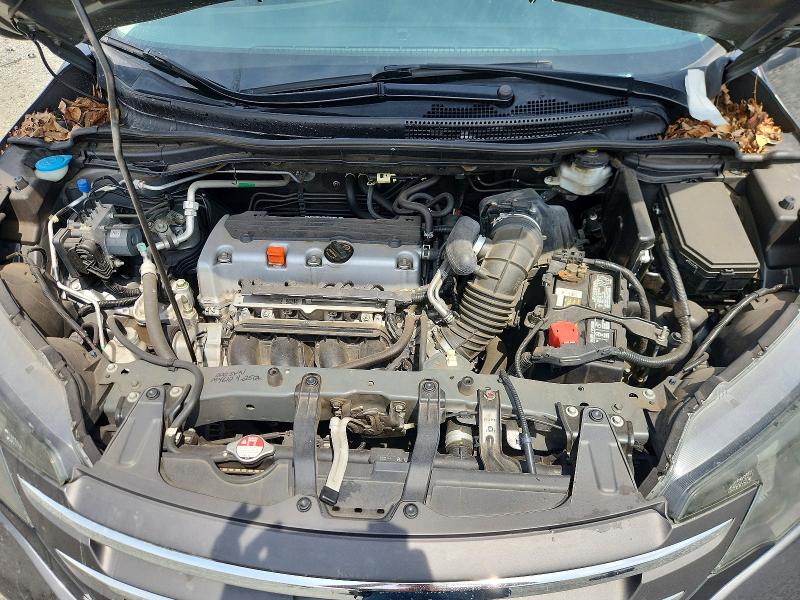 Photo 11 from auction – 2013 HONDA CR-V with VIN 2HKRM3H34DH521582