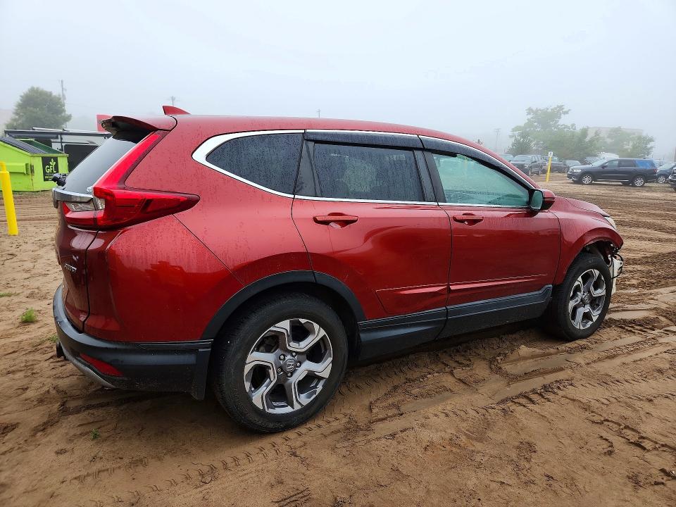 Photo 3 from auction – 2017 HONDA CR-V with VIN 2HKRW2H86HH658965