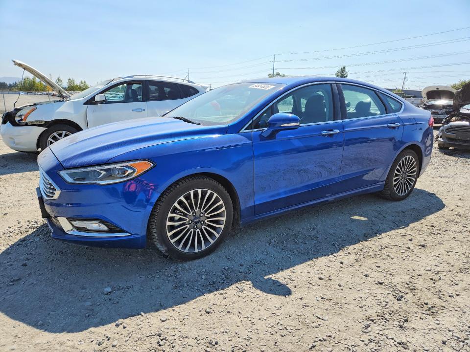 FORD FUSION 2017 with VIN 3FA6P0HDXHR335099 - Photo from auction