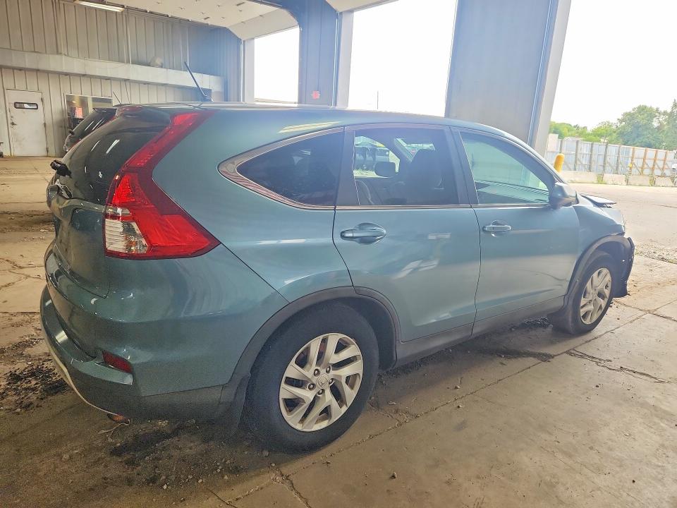 Photo 3 from auction – 2015 HONDA CR-V with VIN 2HKRM3H52FH556416