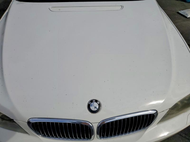 Photo 11 from auction – 2009 BMW 750 with VIN WBAHN83528DT78994