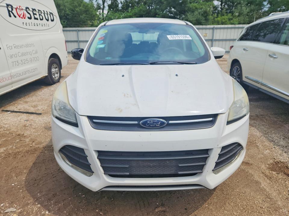 Photo 5 from auction – 2016 FORD ESCAPE with VIN 1FMCU0G7XGUA50231