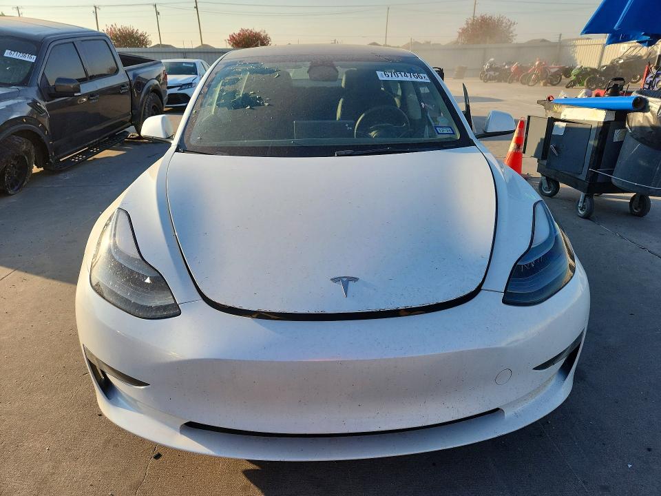 Снимка 5 от търг – 2023 TESLA MODEL 3 с VIN 5YJ3E1EA9PF410720