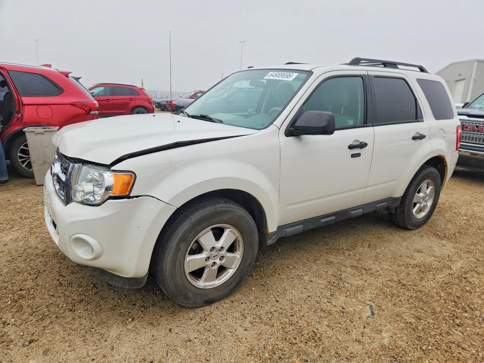 FORD ESCAPE 2011 with VIN 1FMCU0DGXBKA24074 - Photo from auction