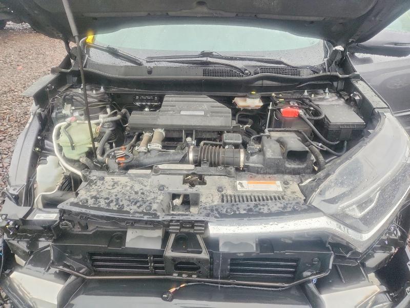 Photo 11 from auction – 2018 HONDA CR-V with VIN 7FARW2H87JE085177