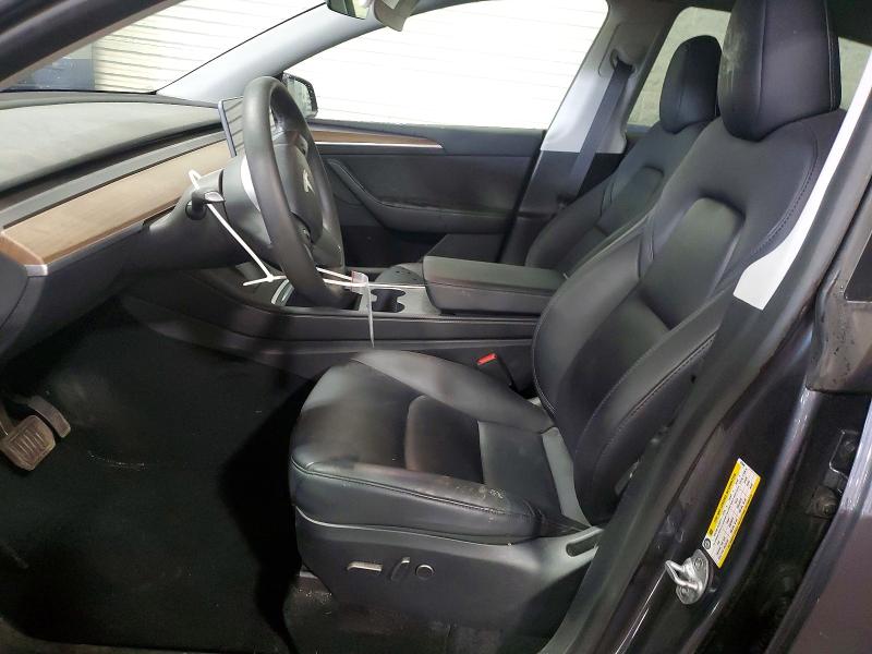 Photo 7 from auction – 2023 TESLA MODEL Y with VIN 7SAYGDEE6PF876645