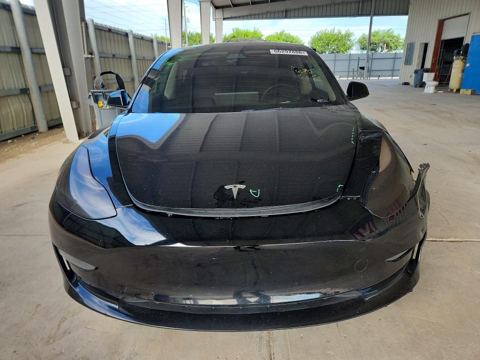 Photo 5 from auction – 2022 TESLA MODEL 3 with VIN 5YJ3E1EB6NF152386