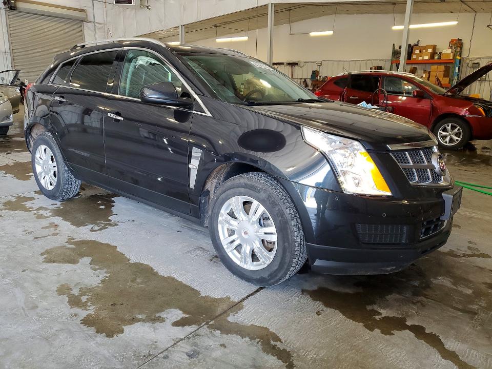 Photo 4 from auction – 2011 CADILLAC SRX with VIN 3GYFNAEYXBS678972
