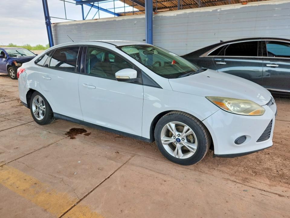 Photo 4 from auction – 2014 FORD FOCUS with VIN 1FADP3F27EL382398