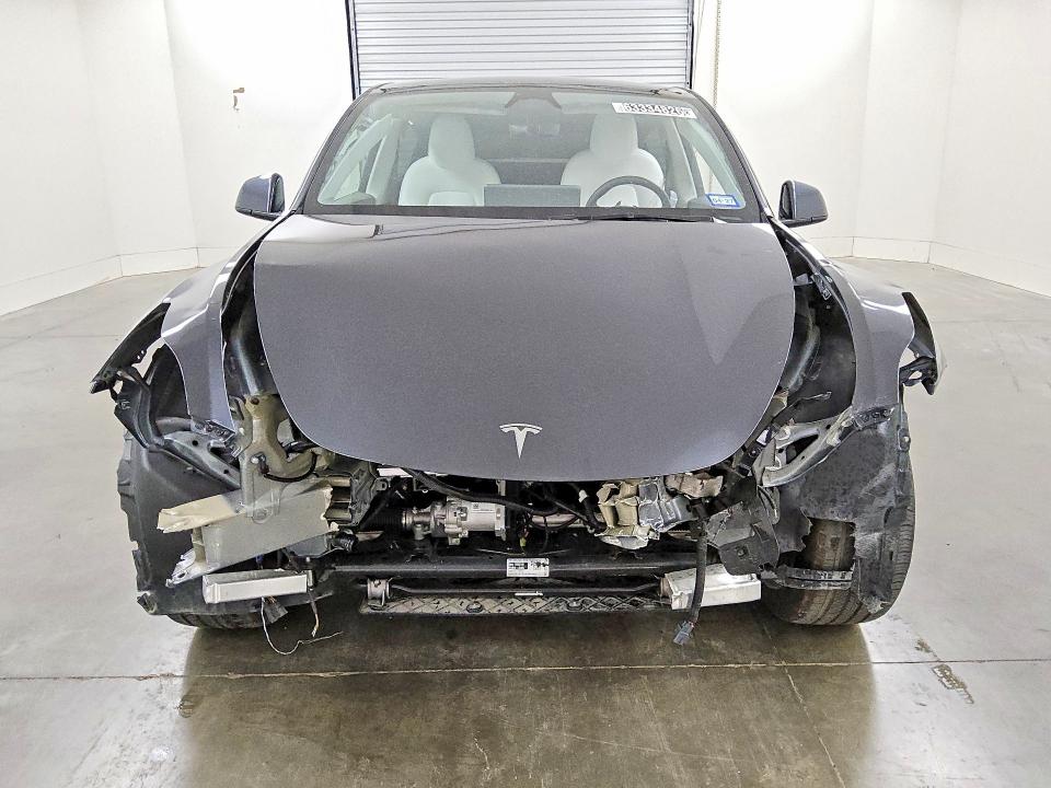 Photo 5 from auction – 2025 TESLA MODEL  Y with VIN 7SAYGDED6SF237231