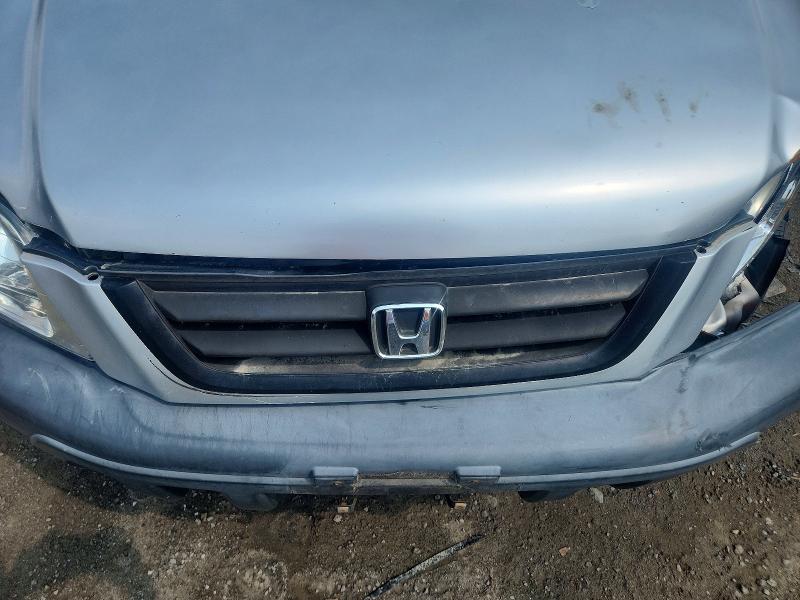 Photo 12 from auction – 1998 HONDA CR-V with VIN JHLRD1845WC103708