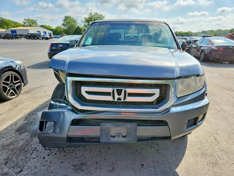 Photo 5 from auction – 2010 HONDA RIDGELINE with VIN 5FPYK1F42AB001061