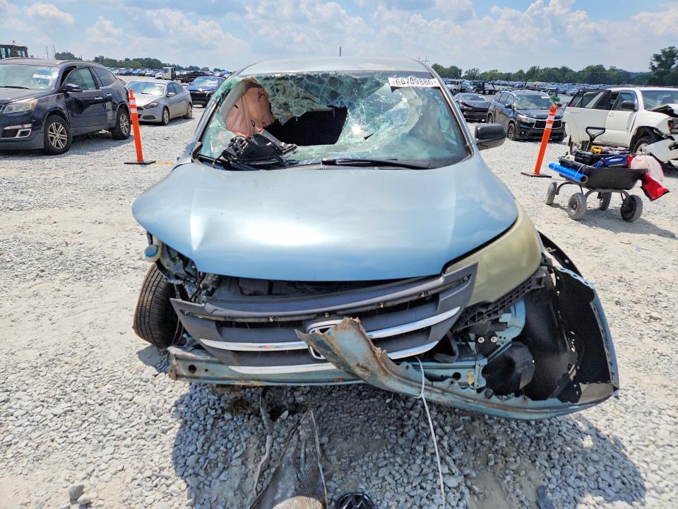 Photo 5 from auction – 2014 HONDA CR-V with VIN 2HKRM4H33EH642546