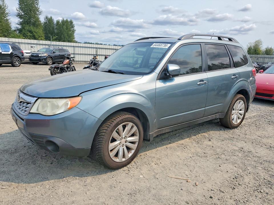 SUBARU FORESTER 2011 with VIN JF2SHBCC5BH780697 - Photo from auction