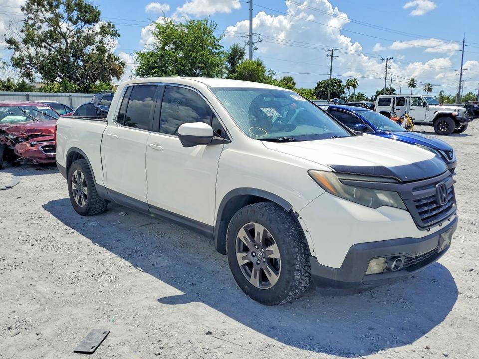 Photo 4 from auction – 2017 HONDA RIDGELINE with VIN 5FPYK2F65HB001797