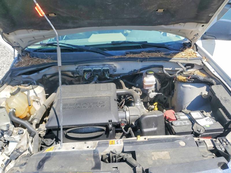 Снимка 12 от търг – 2009 FORD ESCAPE с VIN 1FMCU03G39KA52147