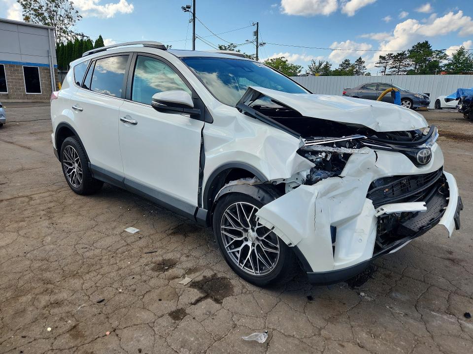 Photo 4 from auction – 2016 TOYOTA RAV4 with VIN 2T3DFREV0GW521024