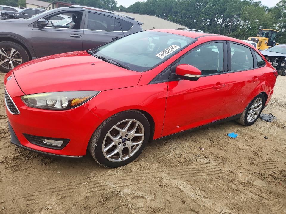 FORD FOCUS 2015 with VIN 1FADP3F21FL365310 - Photo from auction