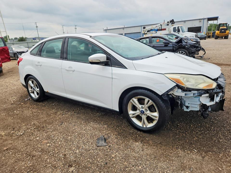Photo 4 from auction – 2014 FORD FOCUS with VIN 1FADP3F25EL157395