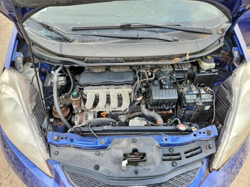 Photo 11 from auction – 2009 HONDA FIT with VIN JHMGE88429S007831