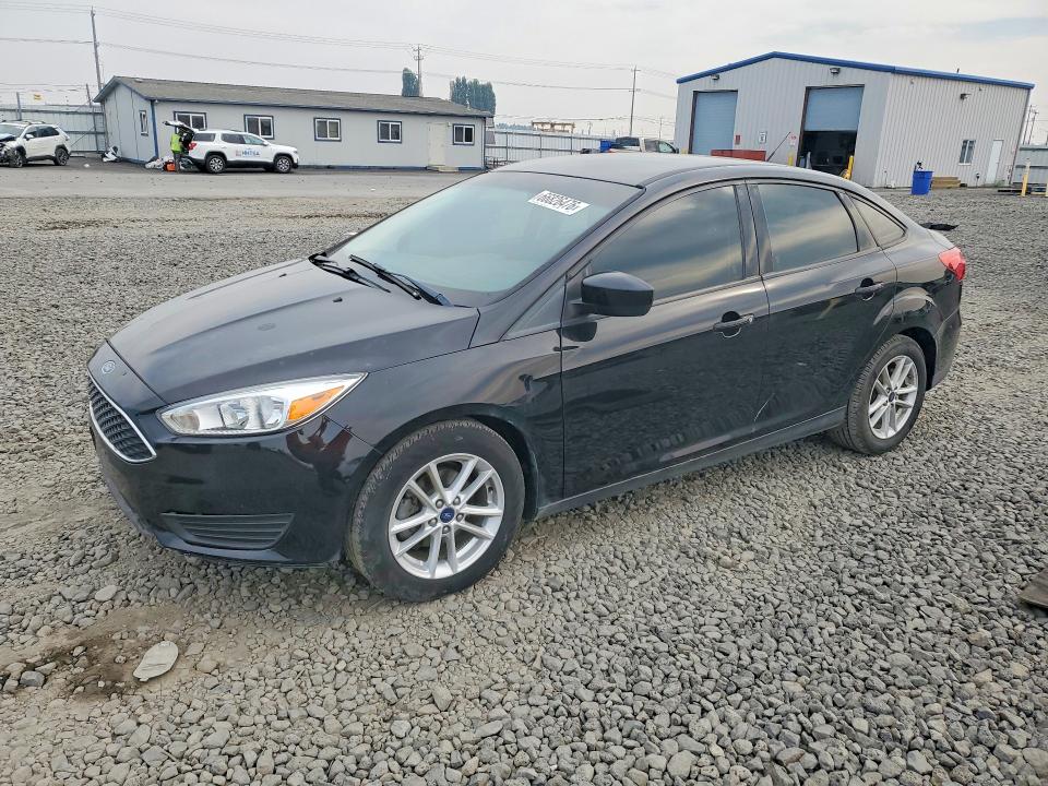 FORD FOCUS 2018 with VIN 1FADP3FE2JL304650 - Photo from auction