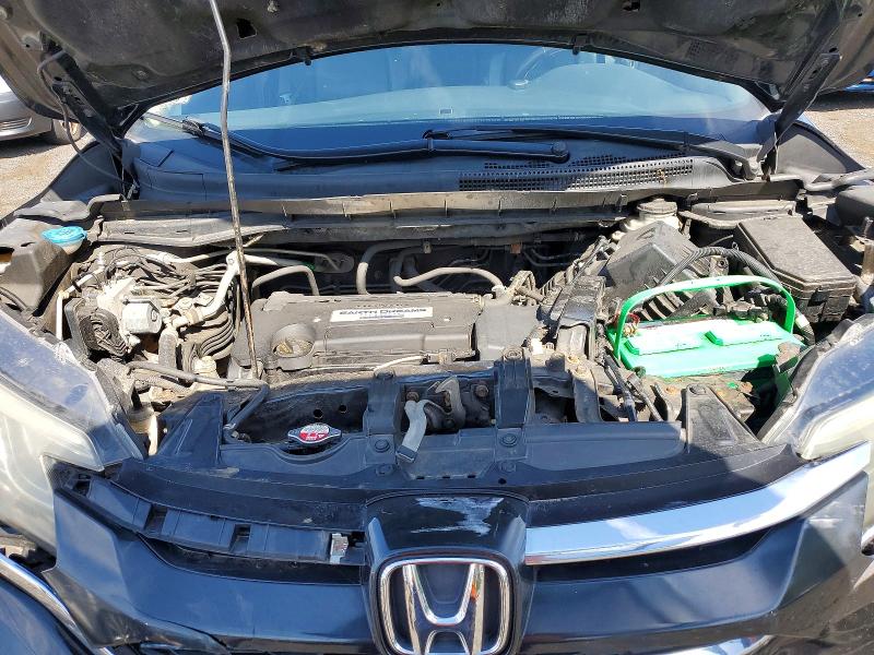 Photo 12 from auction – 2015 HONDA CR-V with VIN 2HKRM4H75FH627616