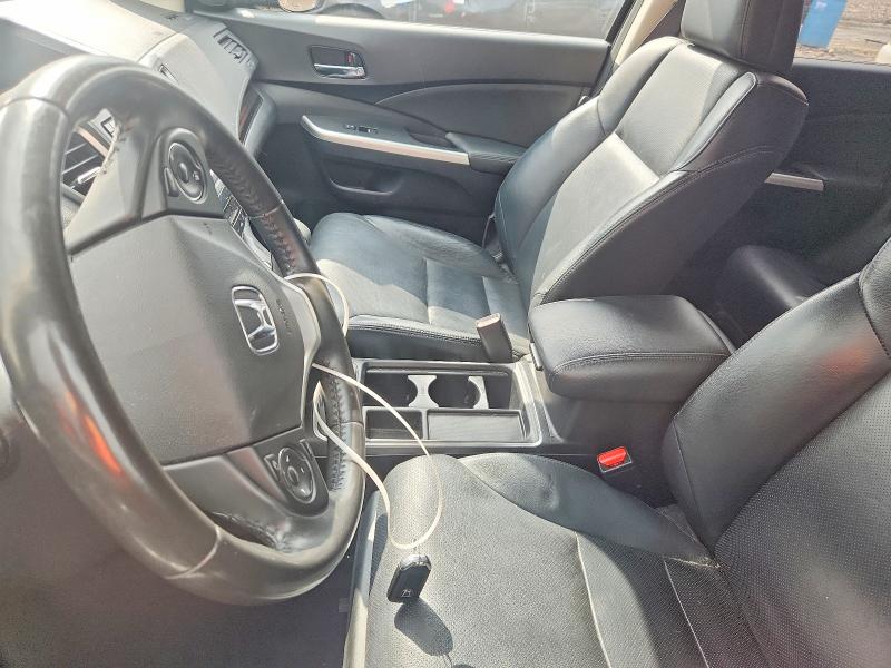 Photo 7 from auction – 2016 HONDA CR-V with VIN 2HKRM4H75GH724672