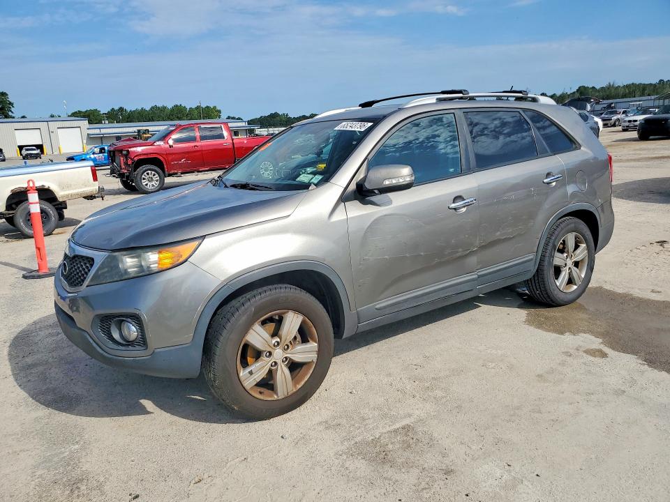 KIA SORENTO 2013 with VIN 5XYKUDA68DG405224 - Photo from auction