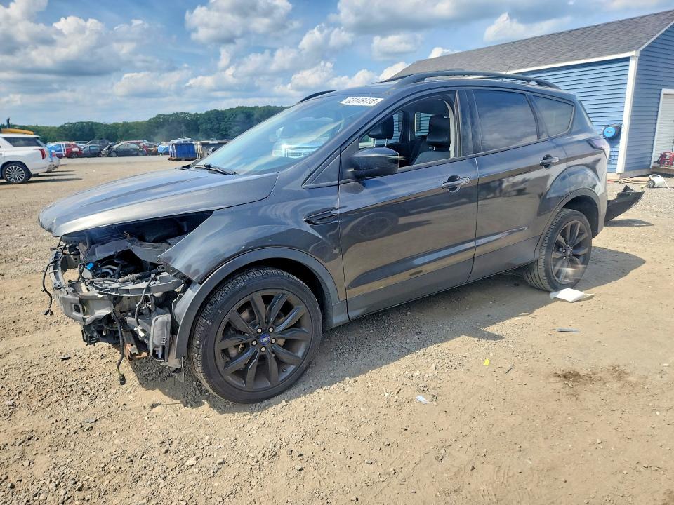FORD ESCAPE 2017 with VIN 1FMCU9GD8HUE62577 - Photo from auction