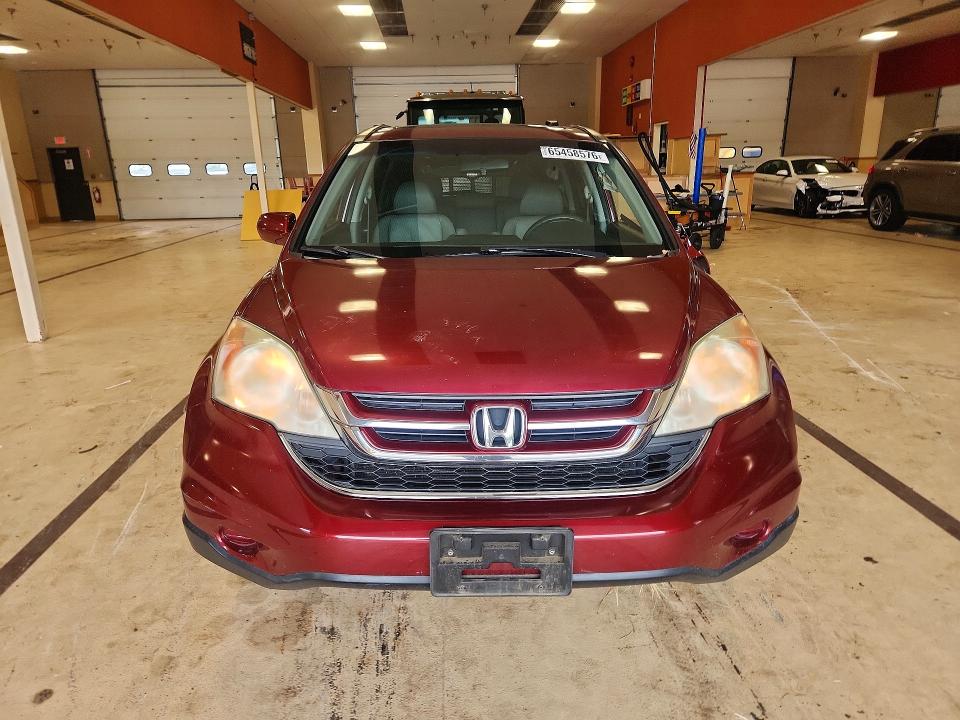 Photo 5 from auction – 2011 HONDA CR-V with VIN 5J6RE4H75BL034674