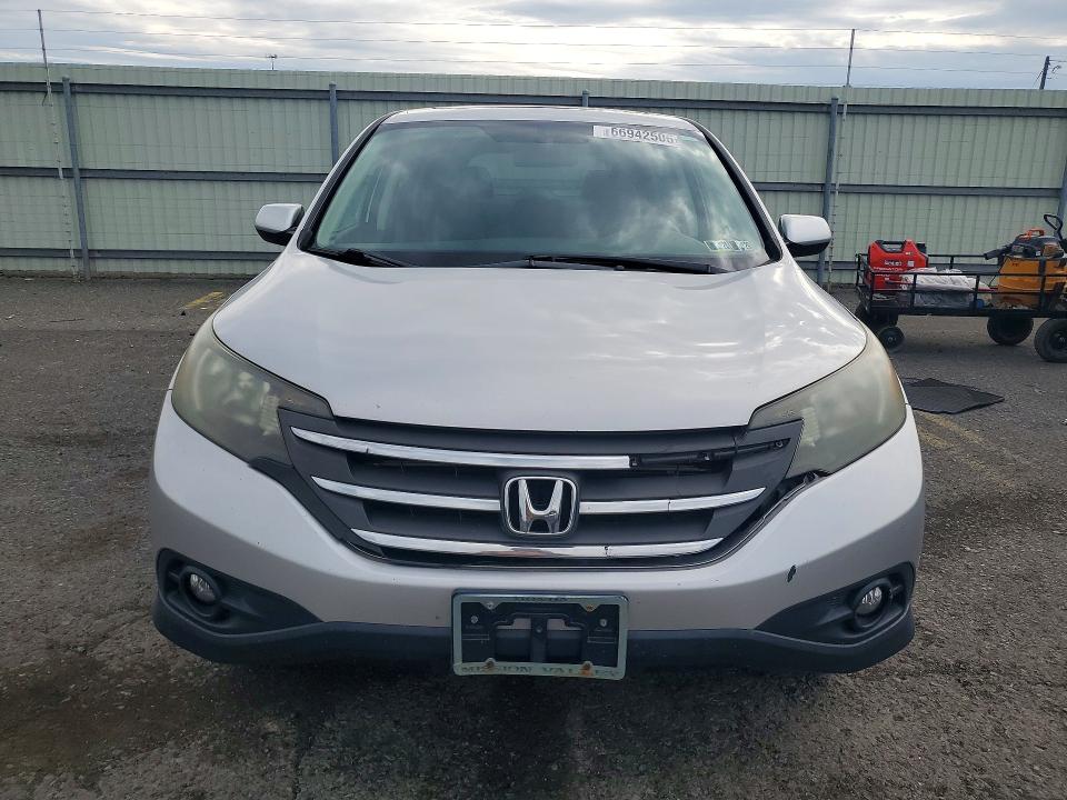 Photo 5 from auction – 2013 HONDA CR-V with VIN 3CZRM3H50DG702540
