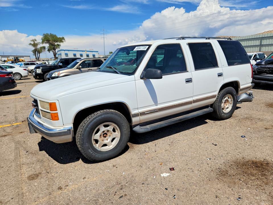 GMC YUKON 1998 with VIN 1GKEK13RXWJ701359 - Photo from auction