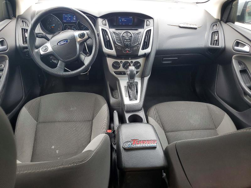 Photo 8 from auction – 2014 FORD FOCUS with VIN 1FADP3F28EL323022