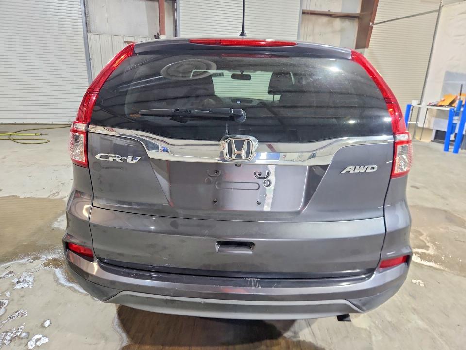 Снимка 6 от търг – 2016 HONDA CR-V с VIN 5J6RM4H33GL013426