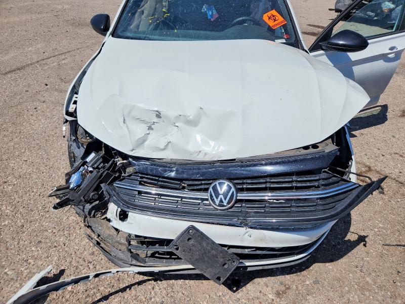 Photo 11 from auction – 2022 VOLKSWAGEN JETTA with VIN 3VWBM7BU4NM034336
