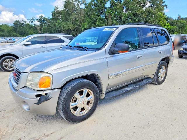 GMC ENVOY 2004 with VIN 1GKDS13S942377049 - Photo from auction