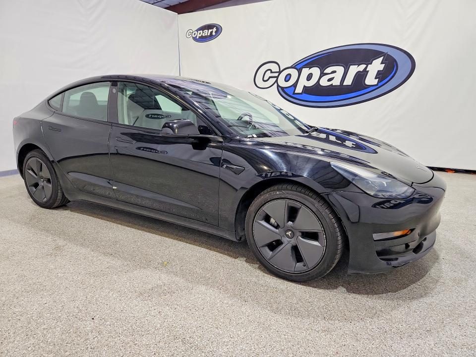 Photo 4 from auction – 2023 TESLA MODEL 3 with VIN 5YJ3E1EA6PF460331