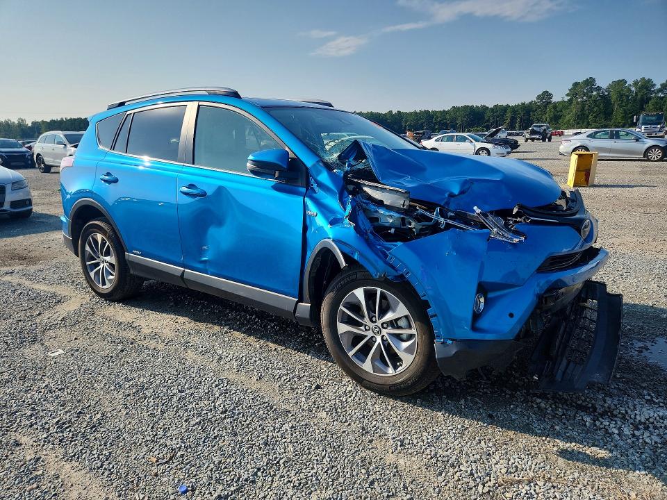Photo 4 from auction – 2018 TOYOTA RAV4 HYBRID with VIN JTMRJREVXJD222066