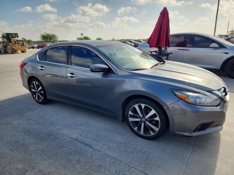 Photo 4 from auction – 2016 NISSAN ALTIMA with VIN 1N4AL3APXGC116409