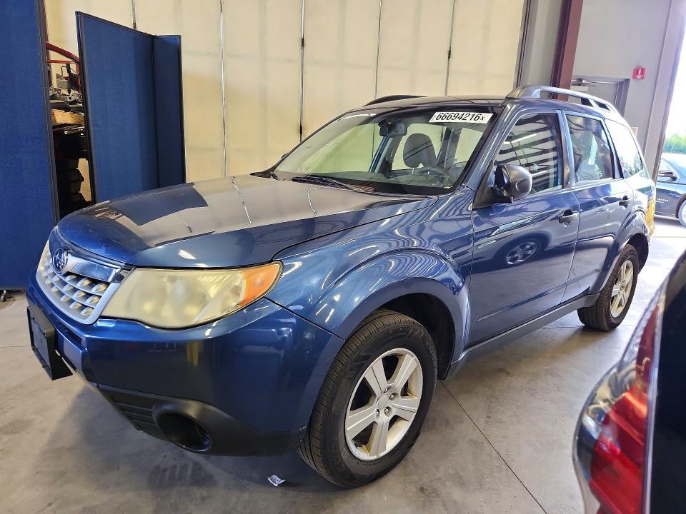 SUBARU FORESTER 2013 with VIN JF2SHABC9DH413431 - Photo from auction