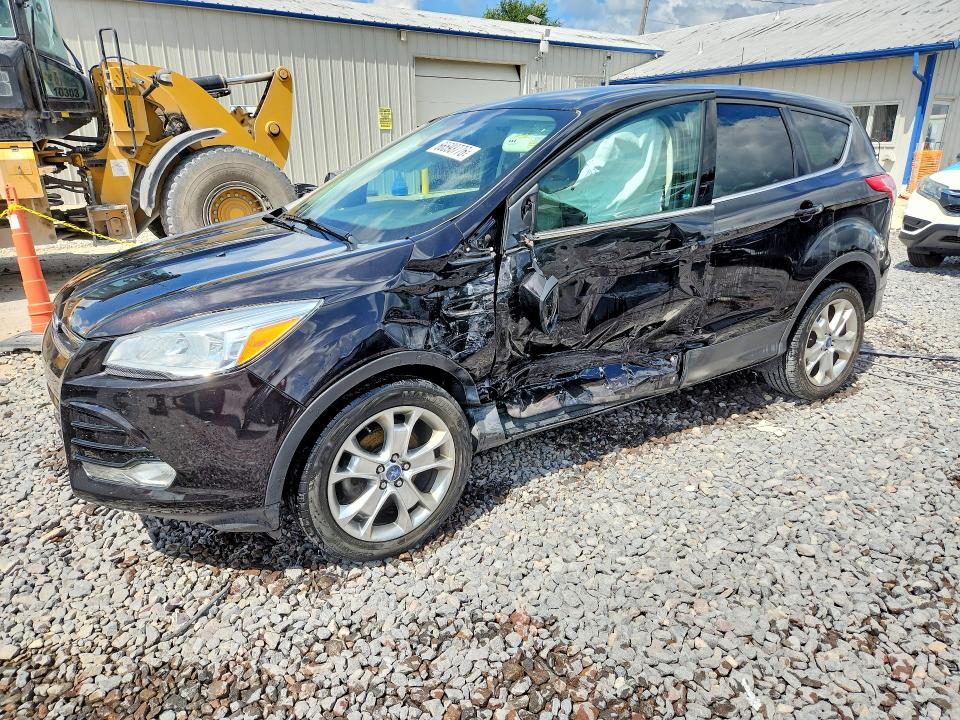 FORD ESCAPE 2013 with VIN 1FMCU0HX1DUB52110 - Photo from auction