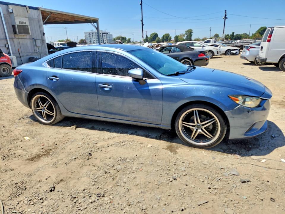 Photo 4 from auction – 2014 MAZDA 6 with VIN JM1GJ1V67E1159937