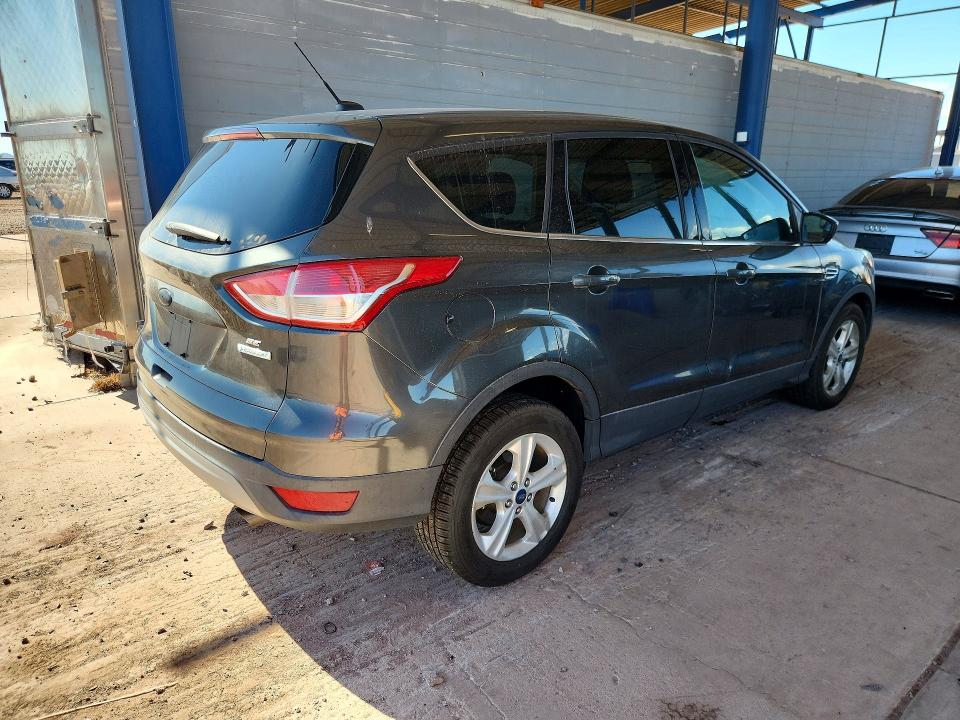 Photo 3 from auction – 2015 FORD ESCAPE with VIN 1FMCU0GX3FUA92139