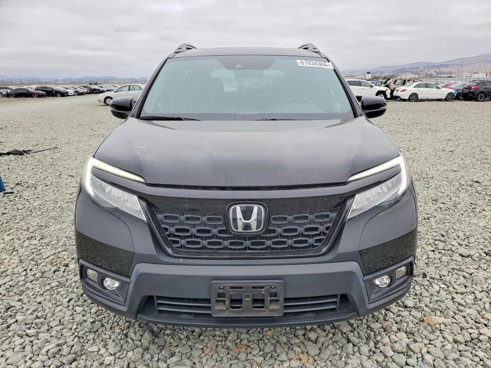 Photo 5 from auction – 2021 HONDA PASSPORT with VIN 5FNYF7H99MB010546