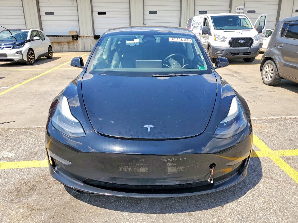 Photo 5 from auction – 2022 TESLA MODEL 3 with VIN 5YJ3E1EA4NF188889