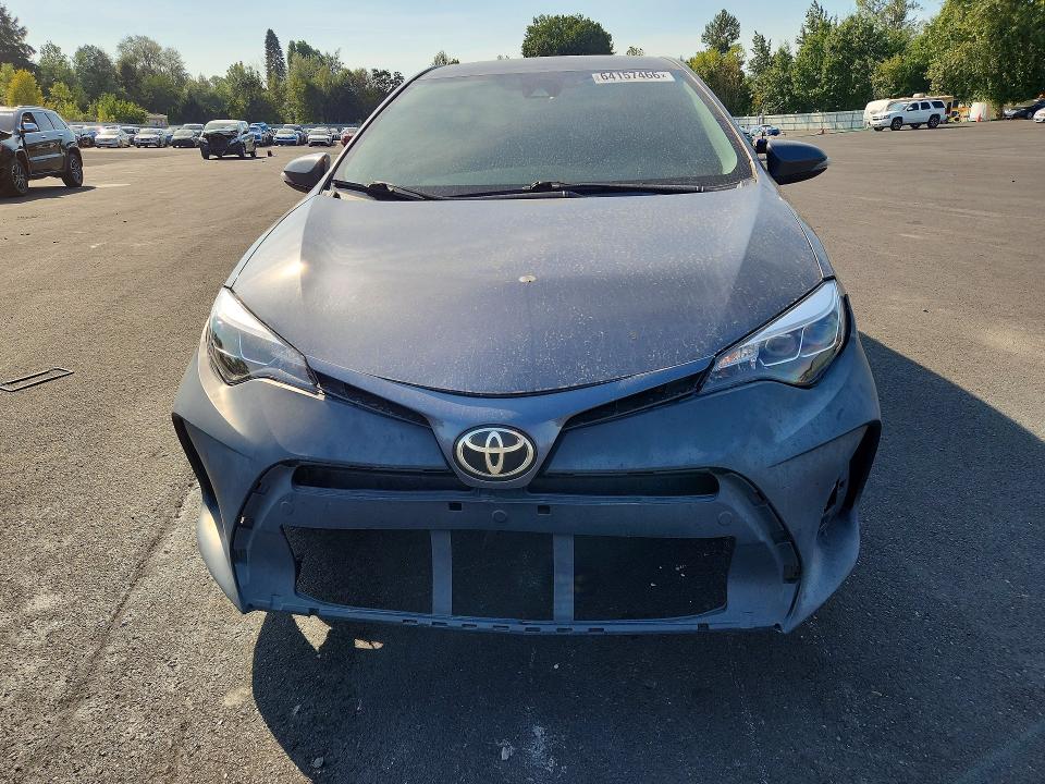 Photo 5 from auction – 2018 TOYOTA COROLLA with VIN 5YFBURHE8JP851116